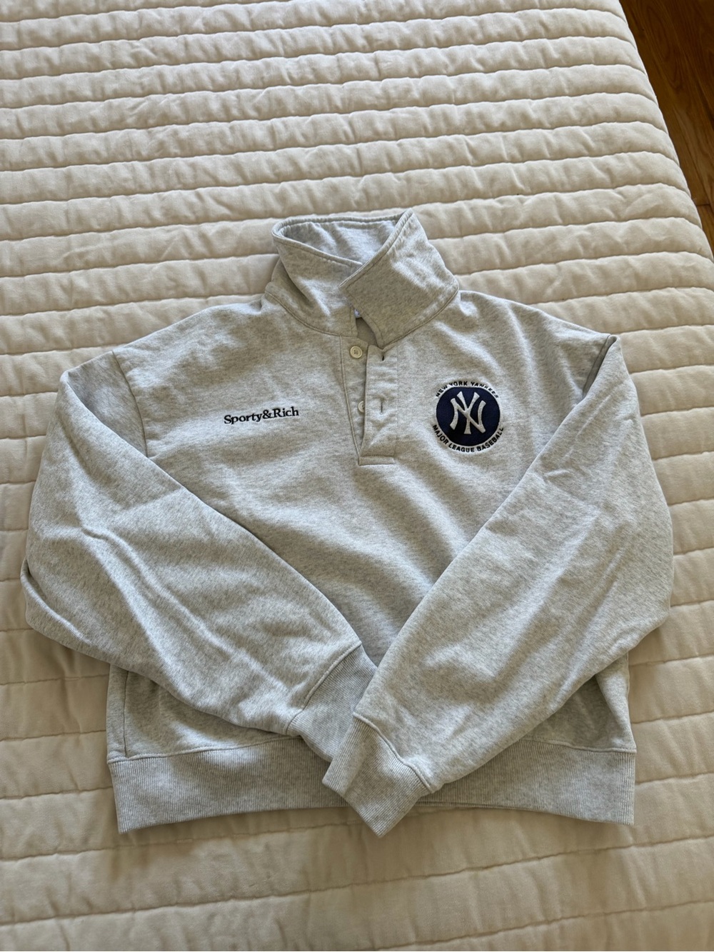 Sporty & Rich light heather gray pullover with navy NY logo